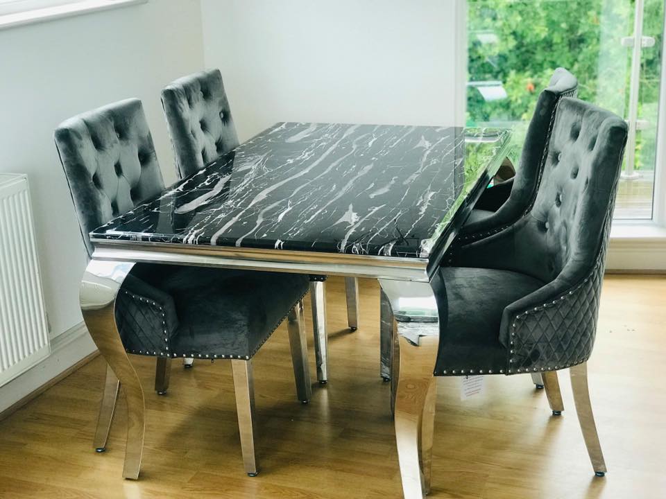 Marmo Black Dining Table And Knocker Back Grey Chairs