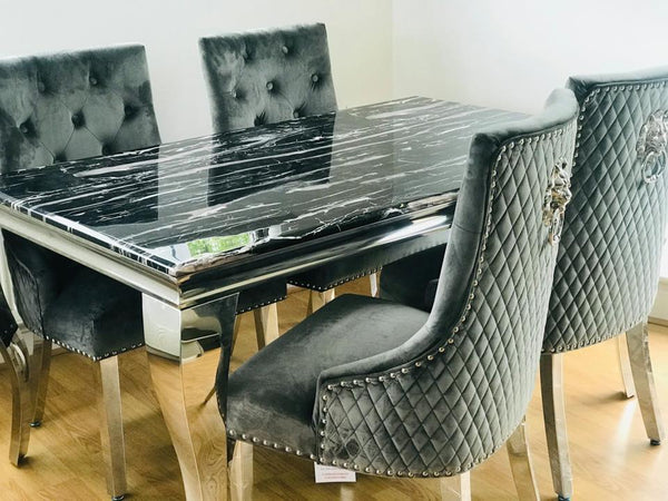 Marmo Black Dining Table And Knocker Back Grey Chairs