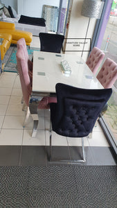 White marmo dining table and six luxury velvet chairs